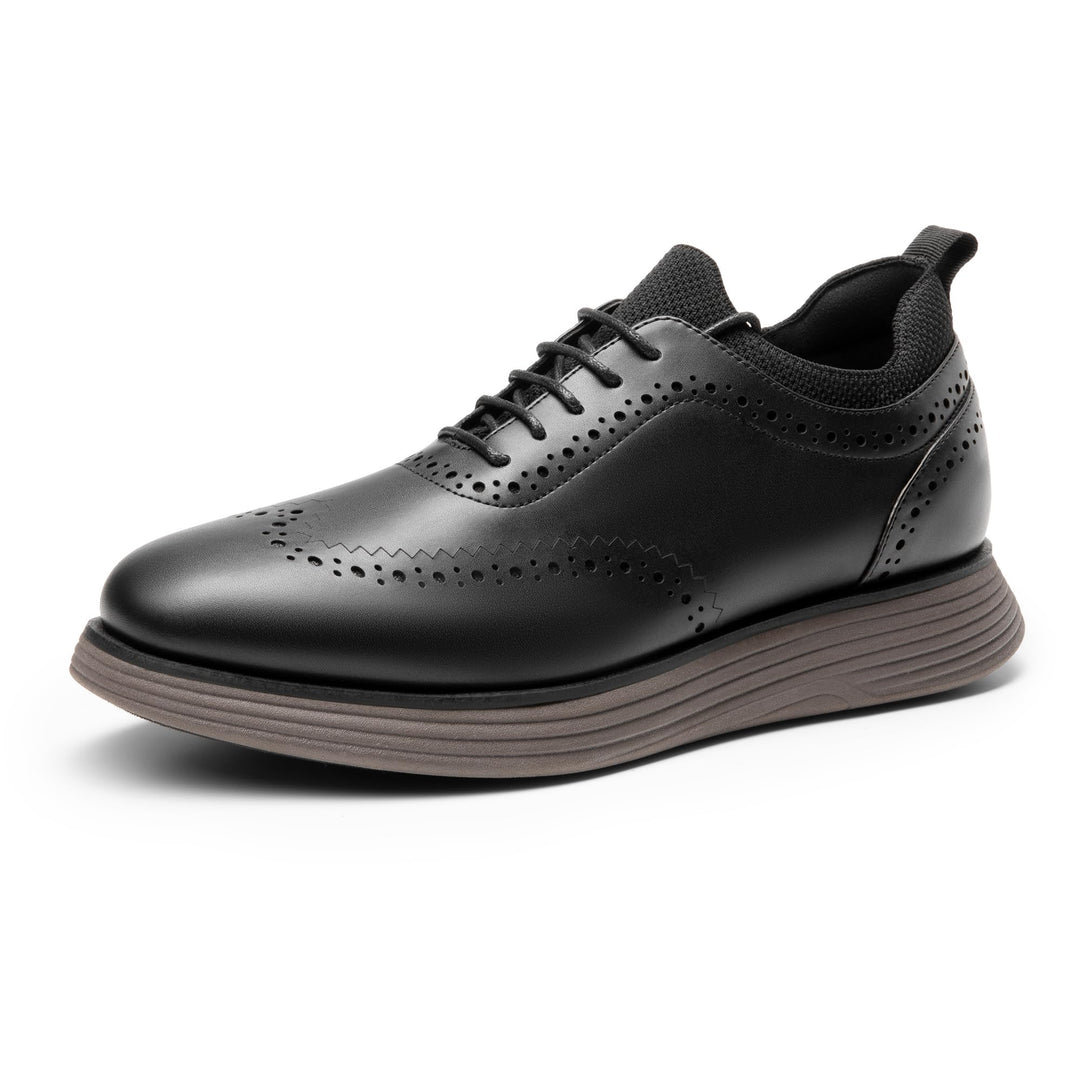 Black wingtip lace-up sneakers with perforations and ribbed rubber sole