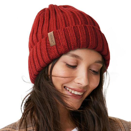 Wine red chunky knit beanie with fleece lining and leather patch