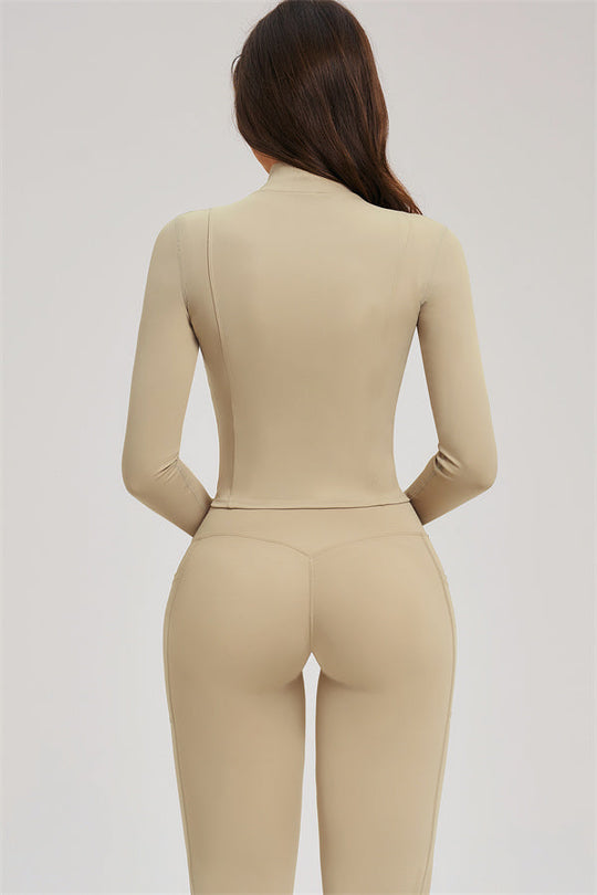 Almond activewear set: back view of zip jacket and flared leggings