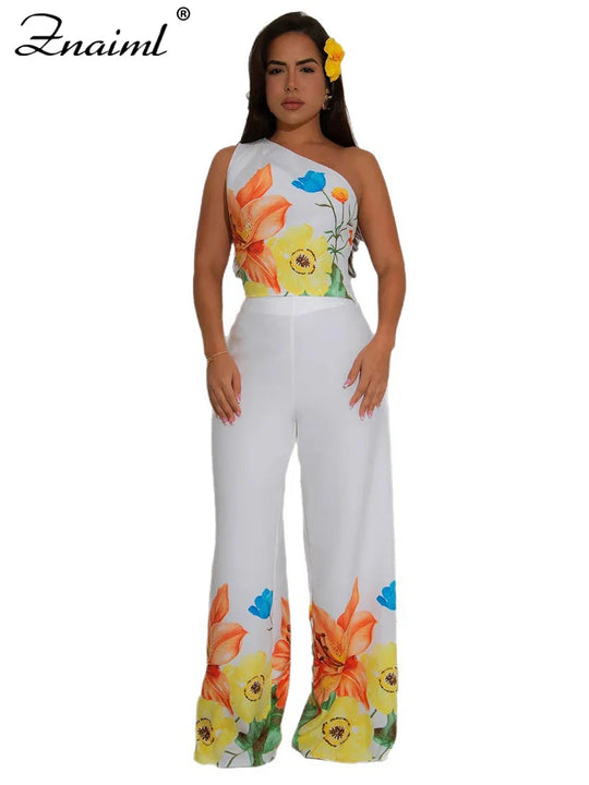 Flower print two-piece set: one-shoulder crop top and wide-leg pants, white with orange/blue