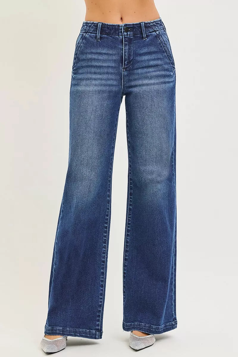 Dark blue high-rise wide-leg jeans with front slanted pockets and button closure