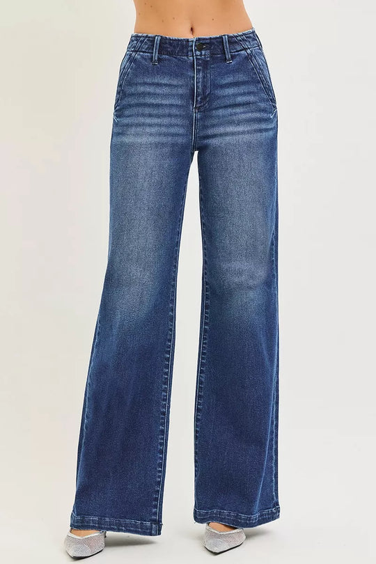 Dark blue high-rise wide-leg jeans with front slanted pockets and button closure