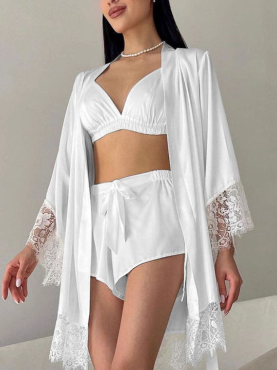 White cami and shorts with flowing lace-trim cardigan hem and sleeve lace panels