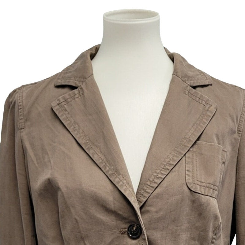 Taupe jacket close-up: notch collar and single front button detail