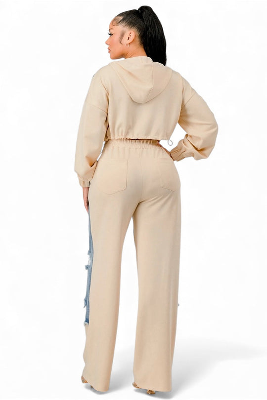 Back view of beige zip hoodie &amp; wide-leg pants set with drawstring waist and blue patches