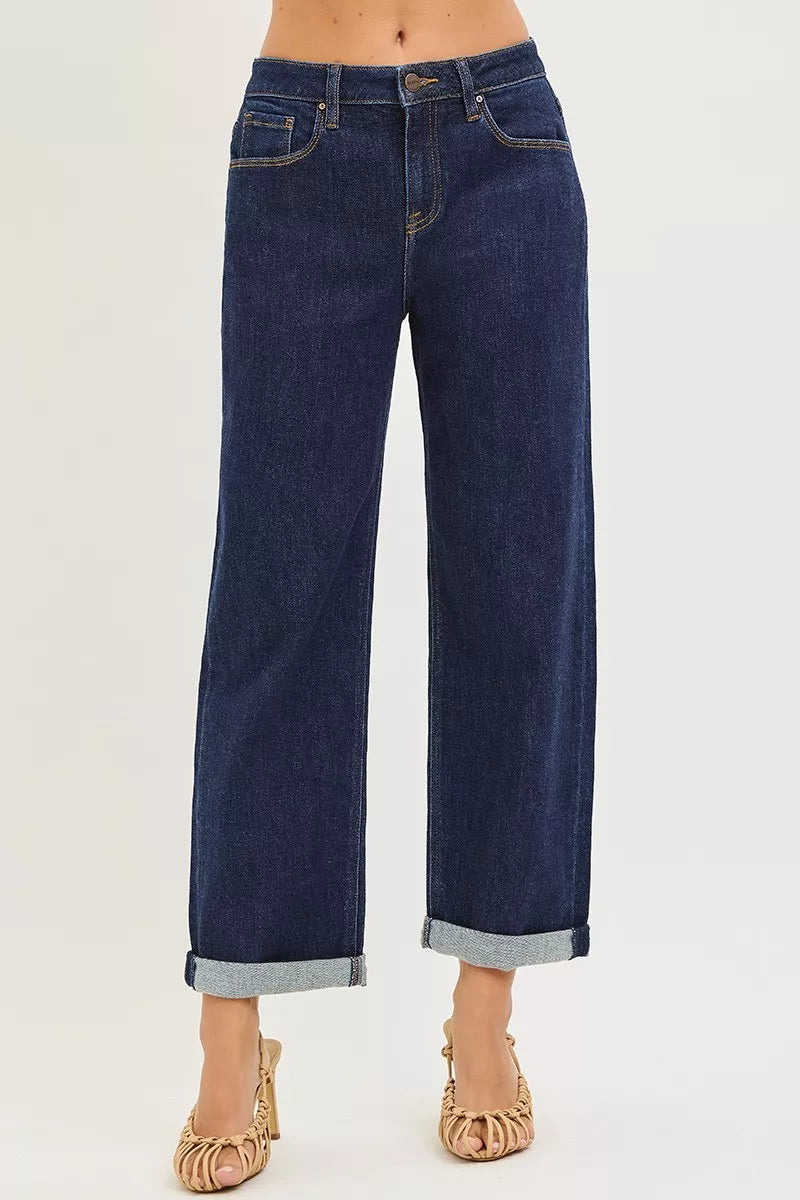 Dark blue slouchy cropped boyfriend jeans, cuffed hem, zip fly and belt loops