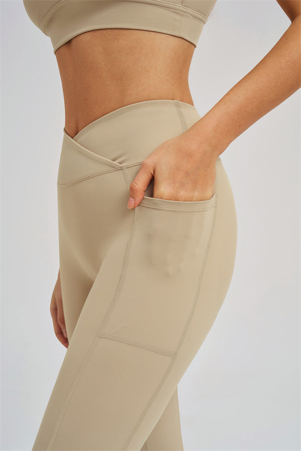 Almond leggings waistband detail with curved seam and front pocket panel