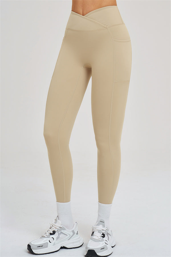 Almond leggings side view with vertical panel stitching