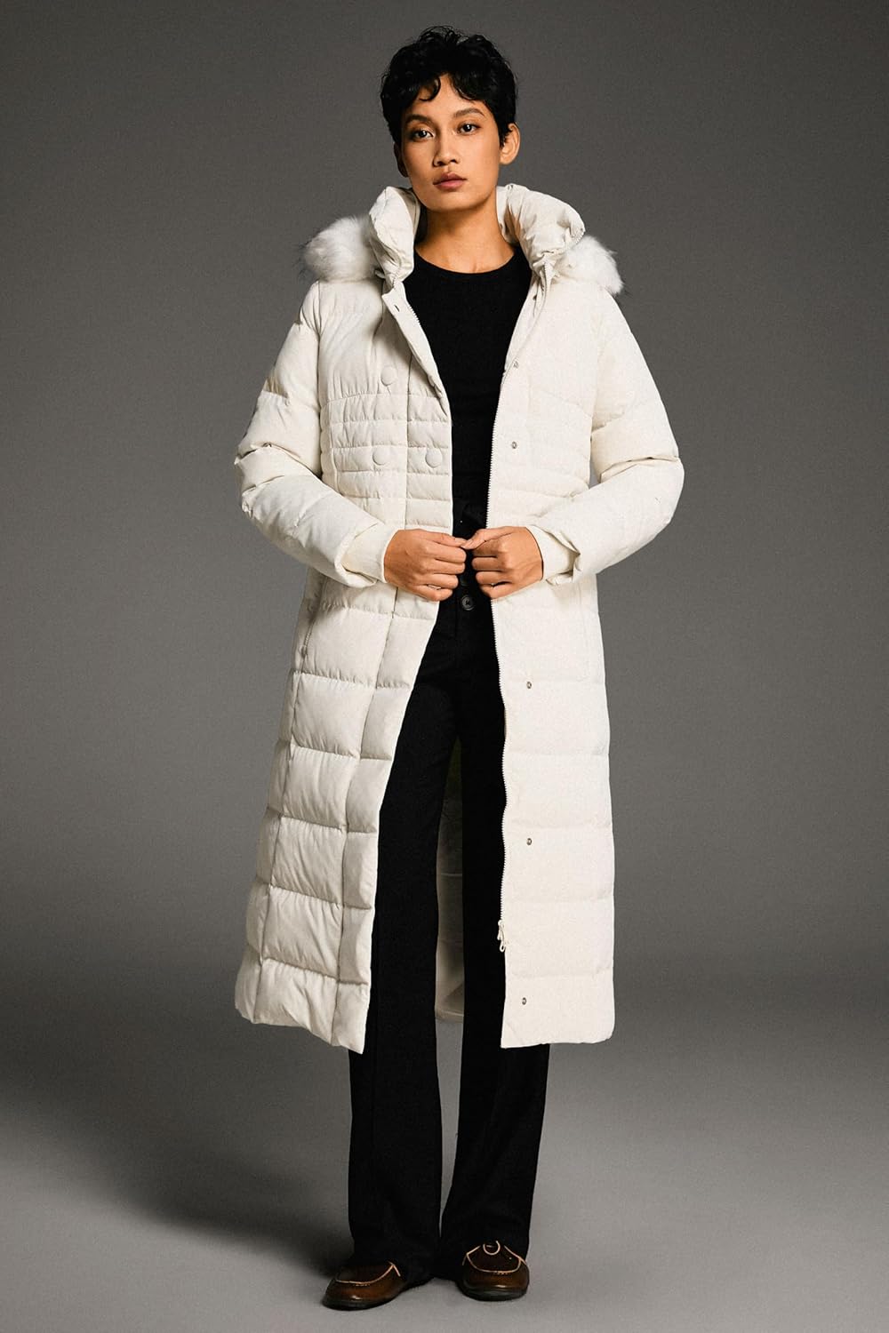 White long puffer jacket with fur-trim hood and front zipper