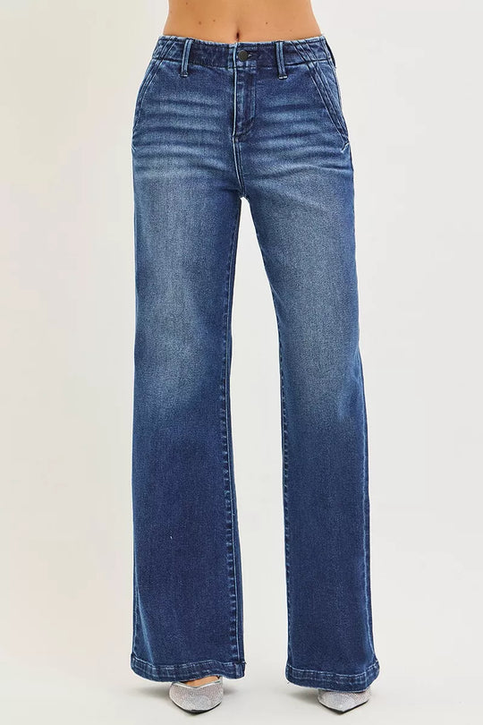 Dark blue high-rise wide-leg jeans back view with belt loops and center seam
