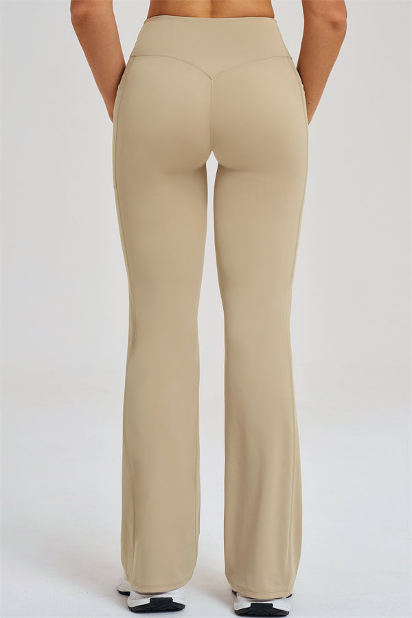 Almond flared leggings, back view, smooth high-rise fit and stitched seams
