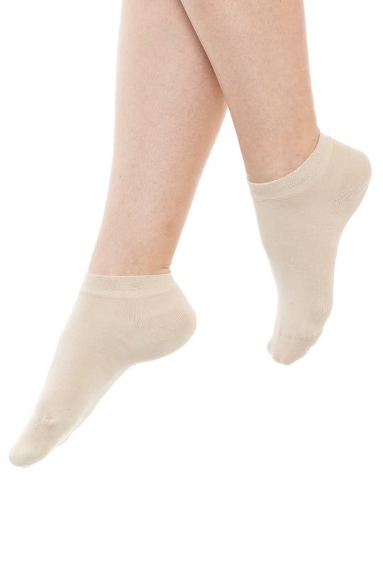 Pair of women’s bamboo ankle socks in light beige, midfoot view