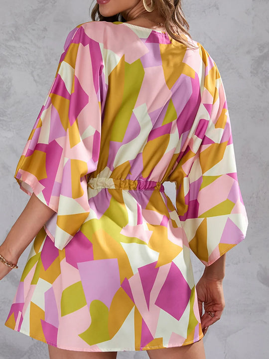 Geometric print button-up mini dress with drawstring waist and wide sleeves