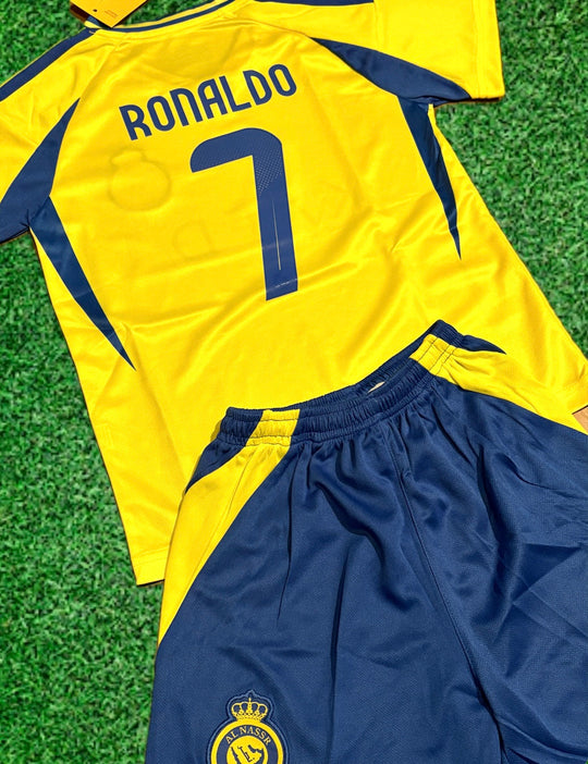 Ronaldo yellow jersey with blue number 7 and name text, with navy shorts