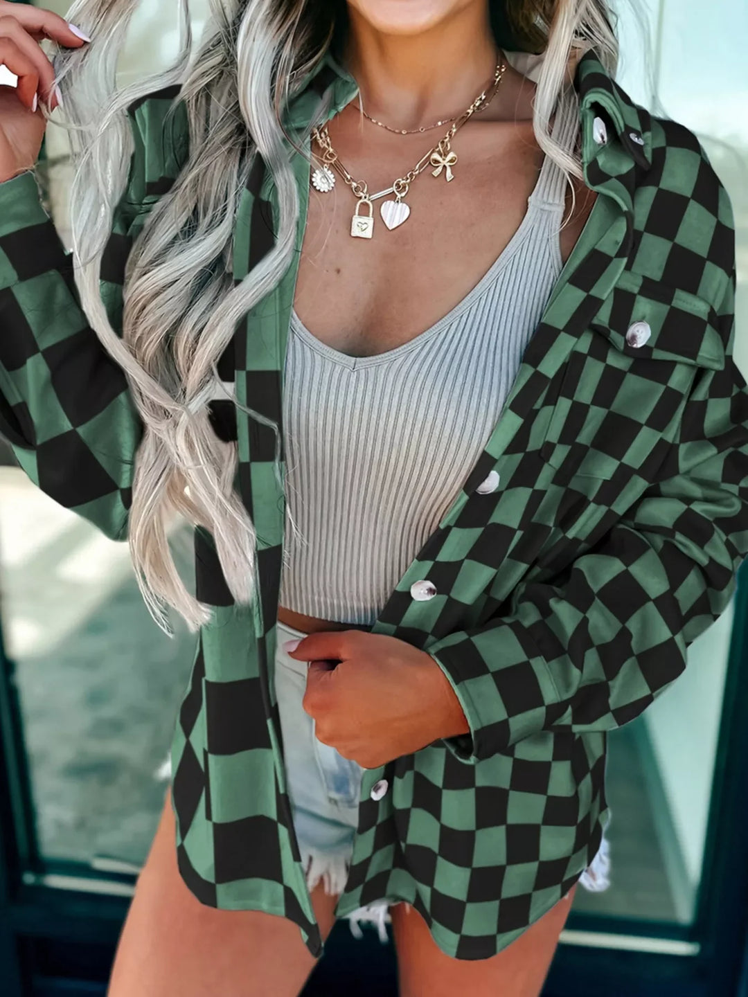 Dark green oversized checkered button-up jacket, front with collar and button placket