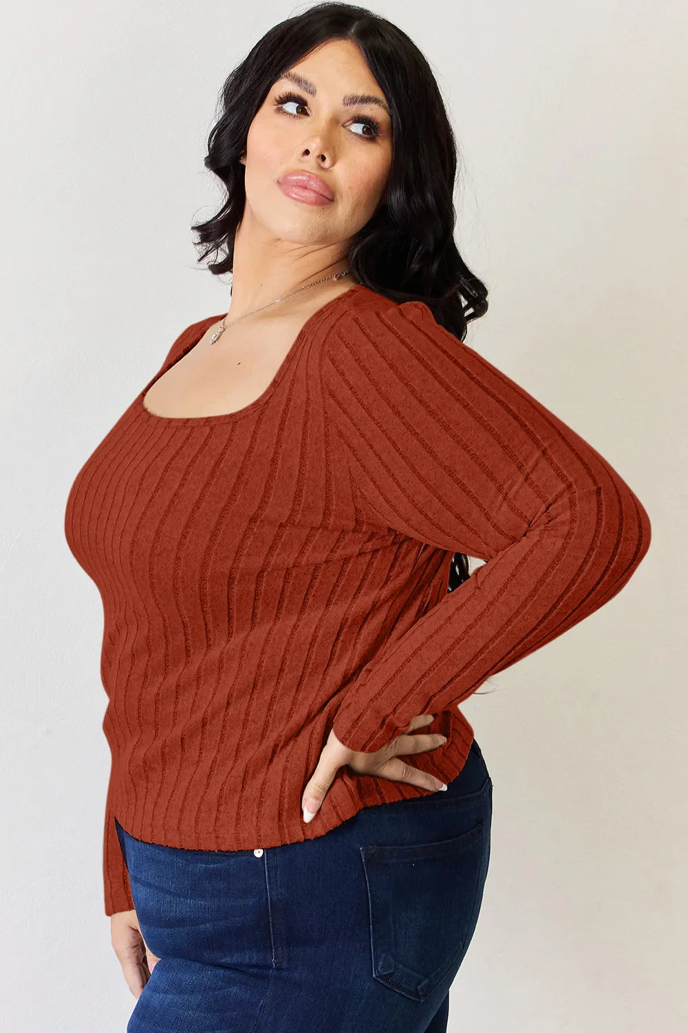 Rust ribbed long-sleeve T-shirt, front view with fitted knit and crew neckline