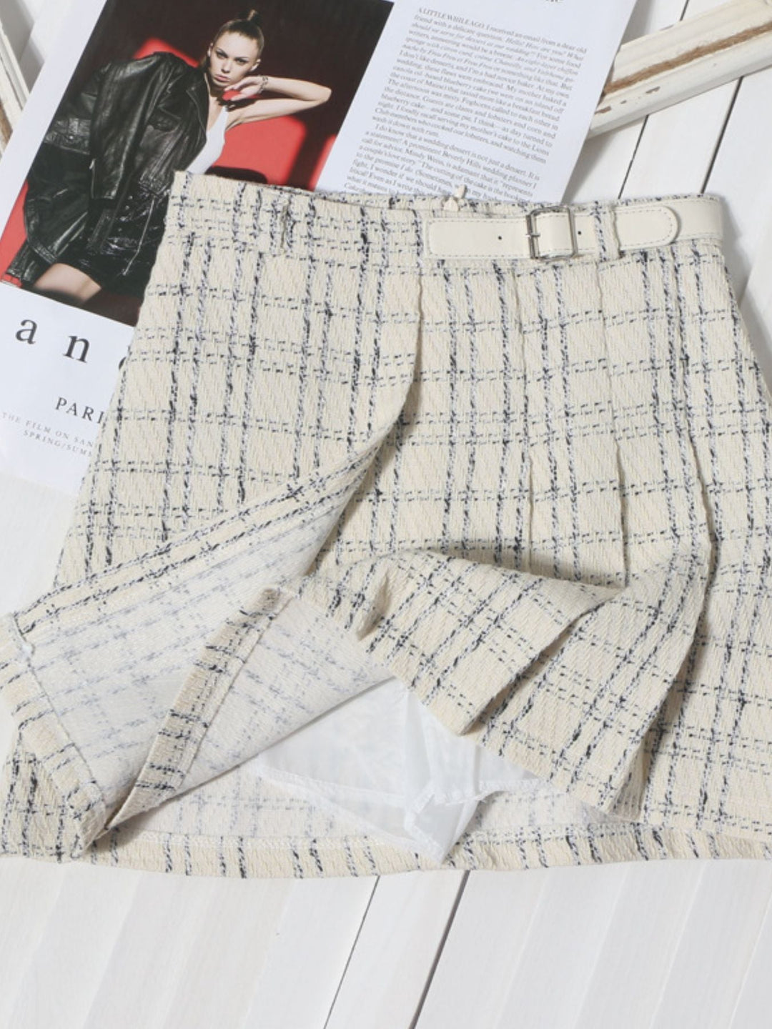 Beige pleated plaid mini skirt with attached belt and blue grid stitching