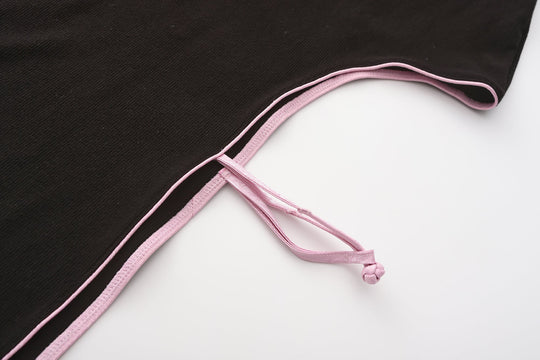 Gao cutout maxi dress tie-strap detail, pink cord crossing and fastening on black fabric