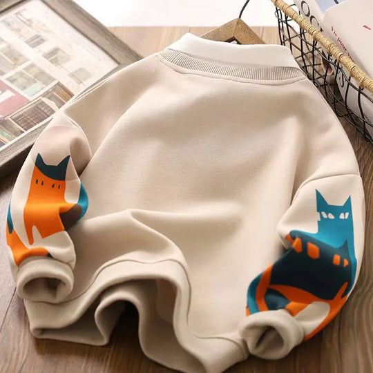 Beige kids long-sleeve hoodie with colorful cat graphic across the back