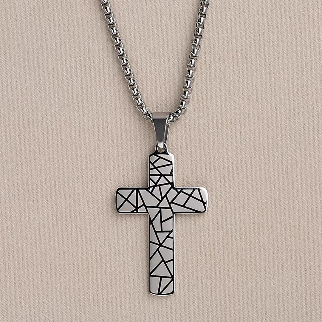 Geometric Cross Necklace: silver chain with black geometric cross pendant and white facets