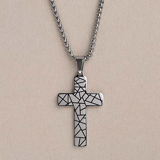 Geometric Cross Necklace: silver chain with black geometric cross pendant and white facets