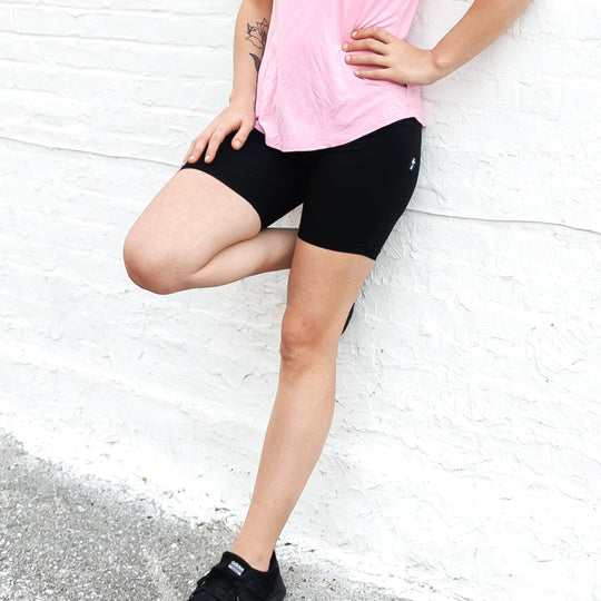 Black biker shorts (midnight), mid-thigh length, high-rise fit.