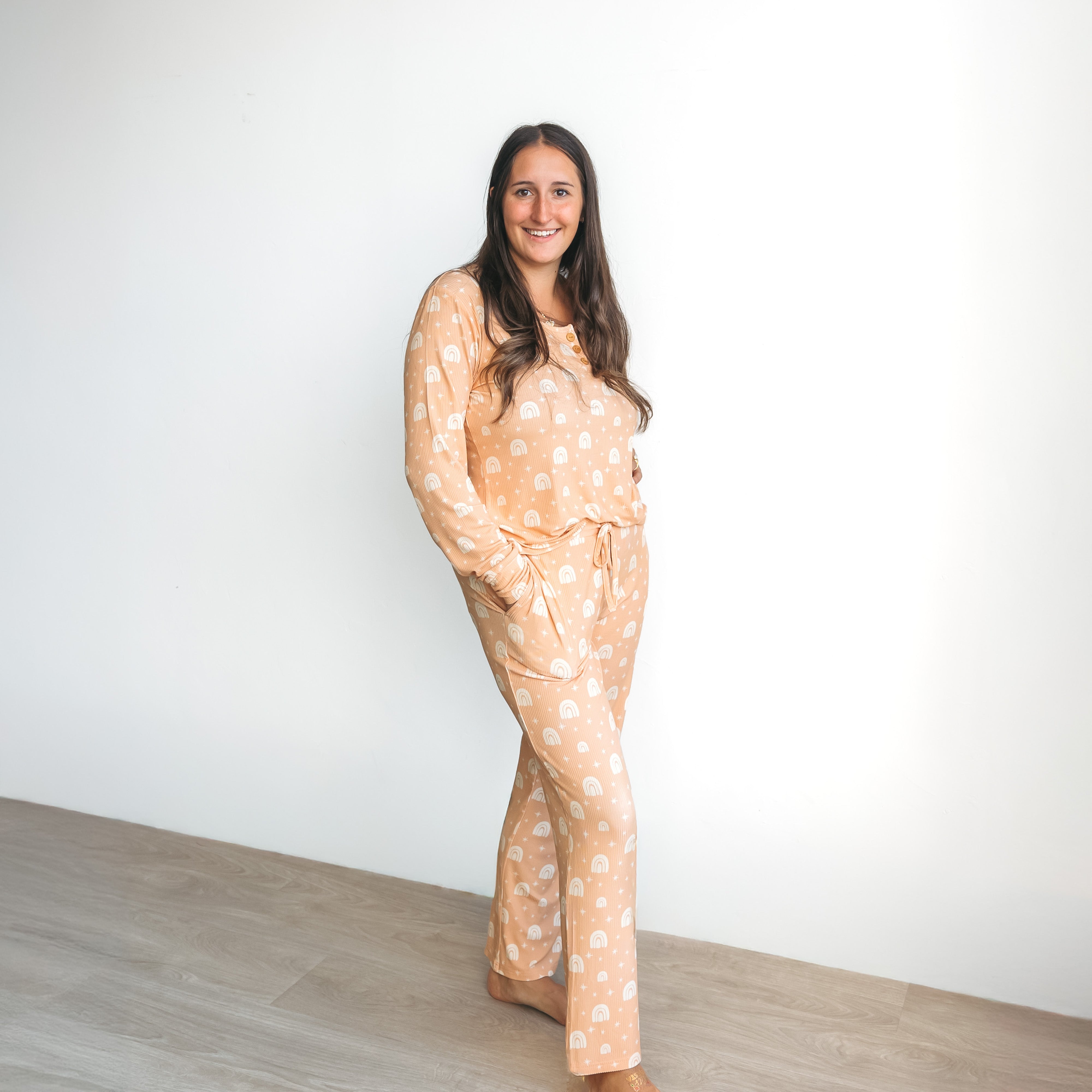 Women’s pajama set peach ribbed knit with rainbow print, long-sleeve top and pants