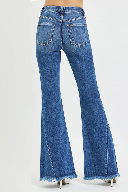Back view: dark wash flare jeans with two rear pockets and belt loops