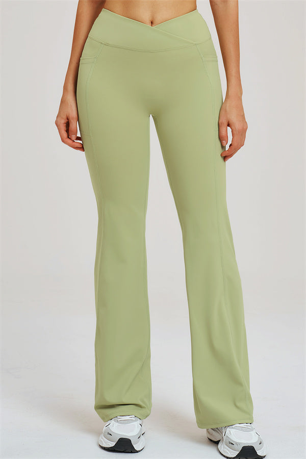 Olive green high-rise flared leggings, full length with side seam panels
