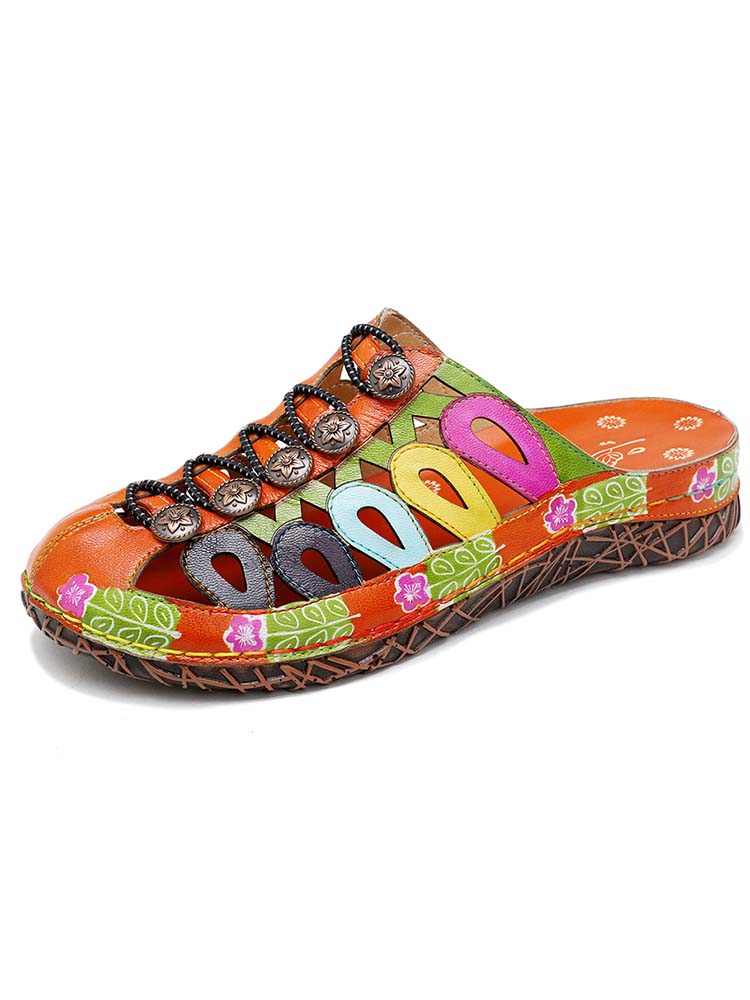 Colorful handmade sandals with cutout uppers, lace straps, and silver-toned metal studs
