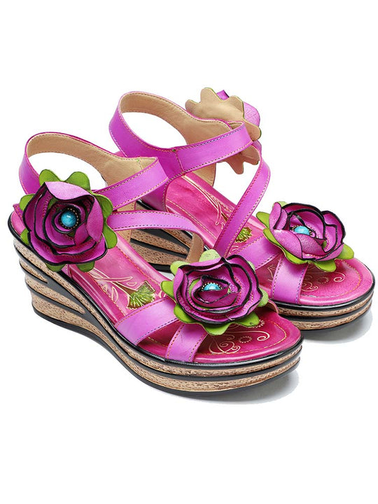 Pink handmade rose wedge sandals with three-flower detail and ankle-strap buckle