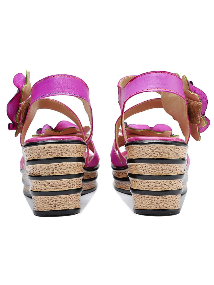 Back view of pink rose wedge sandals with stacked wedge heel and ankle straps