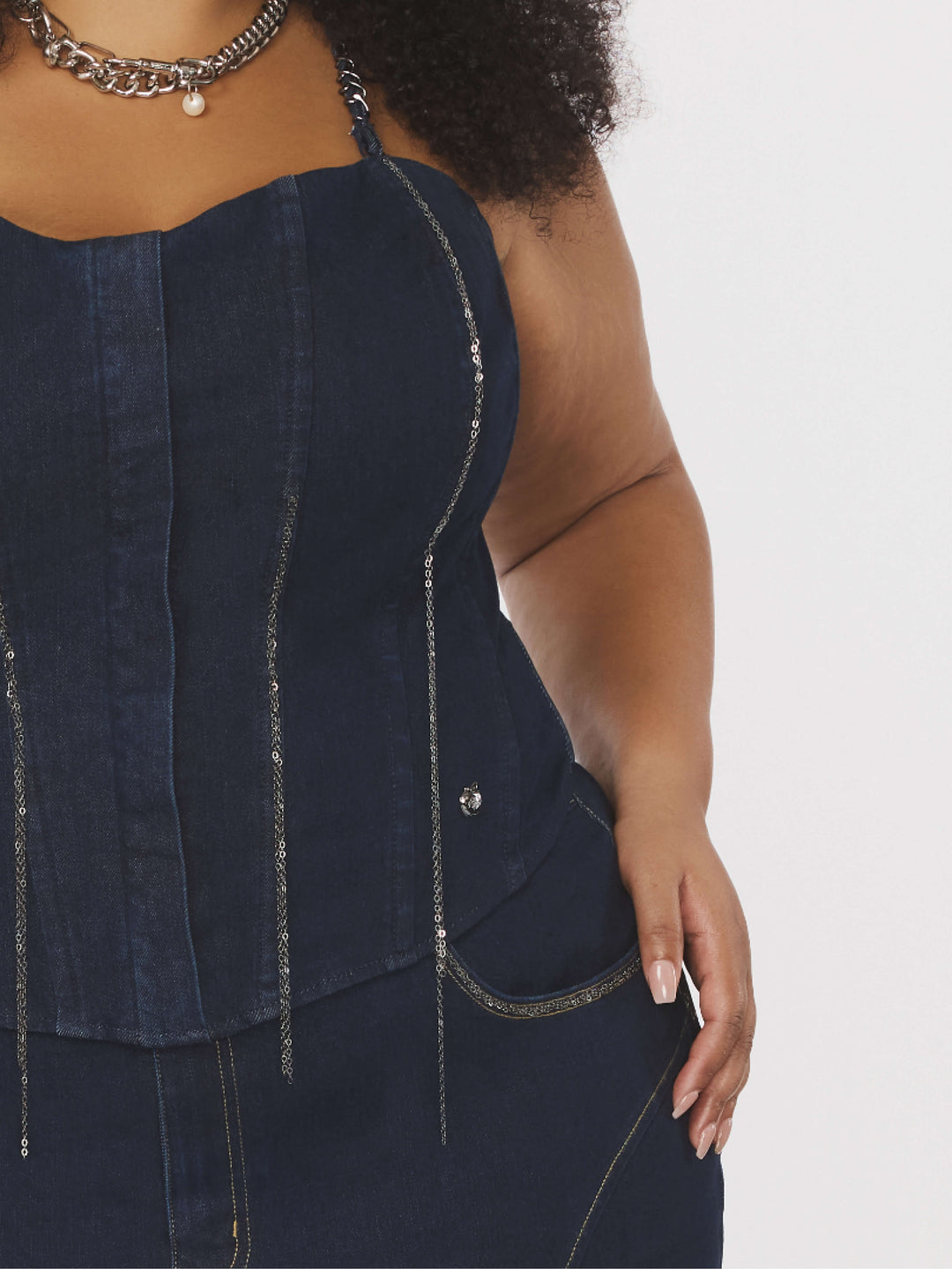 Chain Link Bustier side detail: curved pocket, long chain drops, dark denim corset