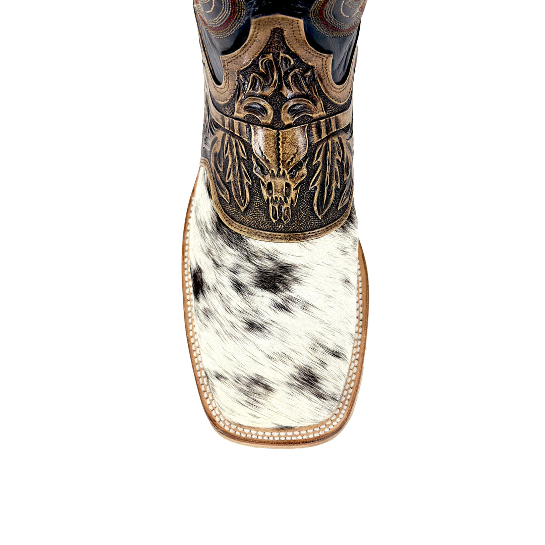 Hand-tooled bulldog head on boot shaft: dark leather with carved detailing above cowhide