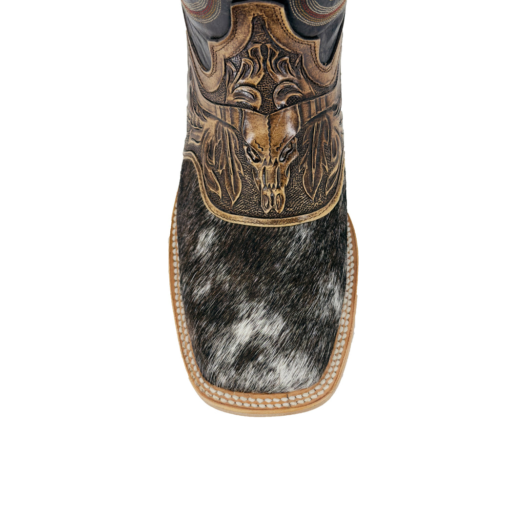 Boot cuff and toe: black-and-white cowhide with stitched leather edge and carved motif