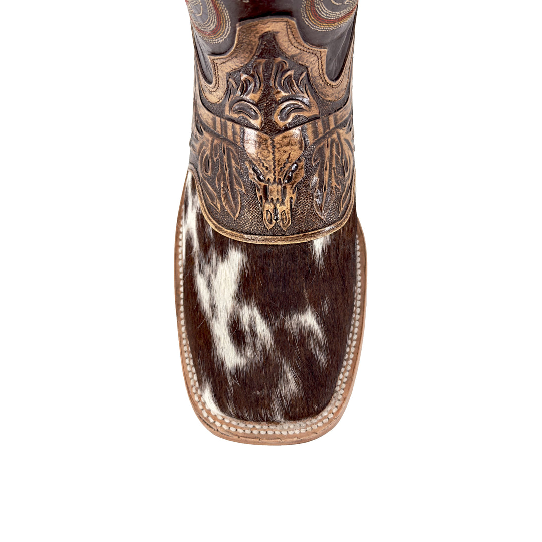 Cowhide boot vamp and toe: black-and-white hide with hand-tooled bulldog emblem