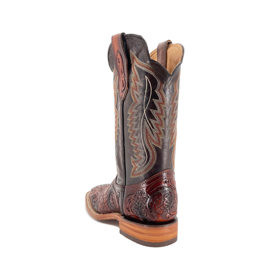 Cognac cowboy boots rear view: dark shaft, decorative inlays and carved heel area