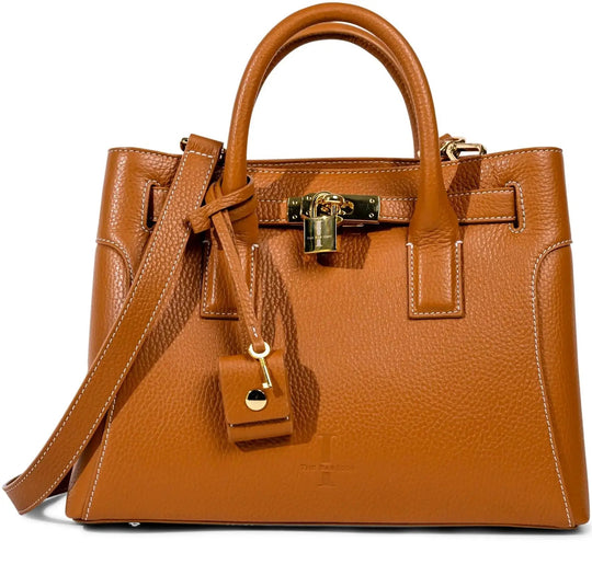 THE SHARON CLAUDIA Handtasche mit Trageriemen, Schließeinsatz und Anhänger am Griff