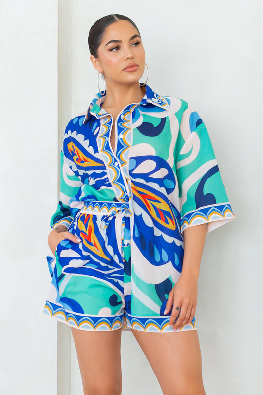 Joanna short set in blue, teal, and white abstract print; button-up top and shorts