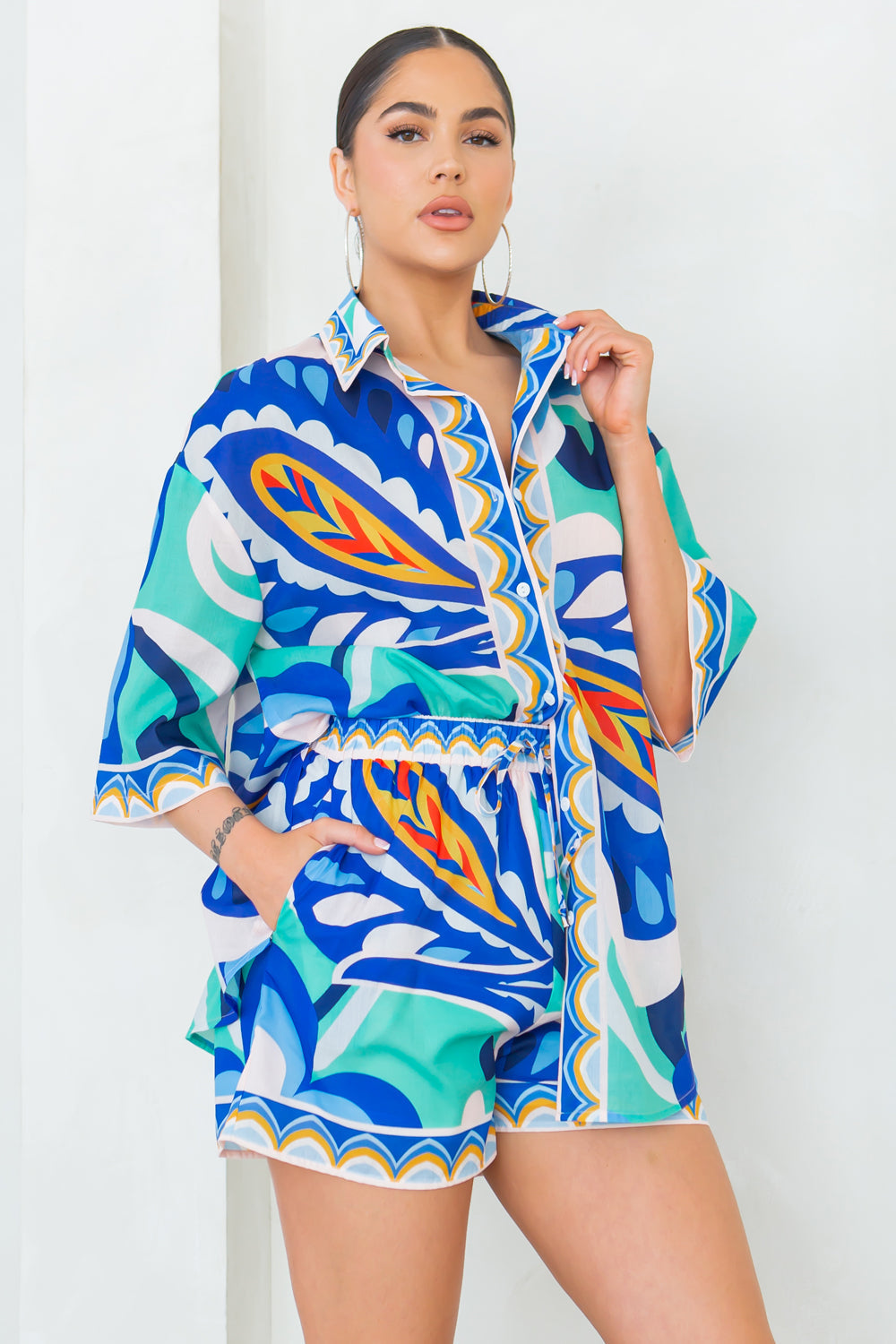 Joanna short set in blue-toned abstract print; open collar shirt with matching shorts