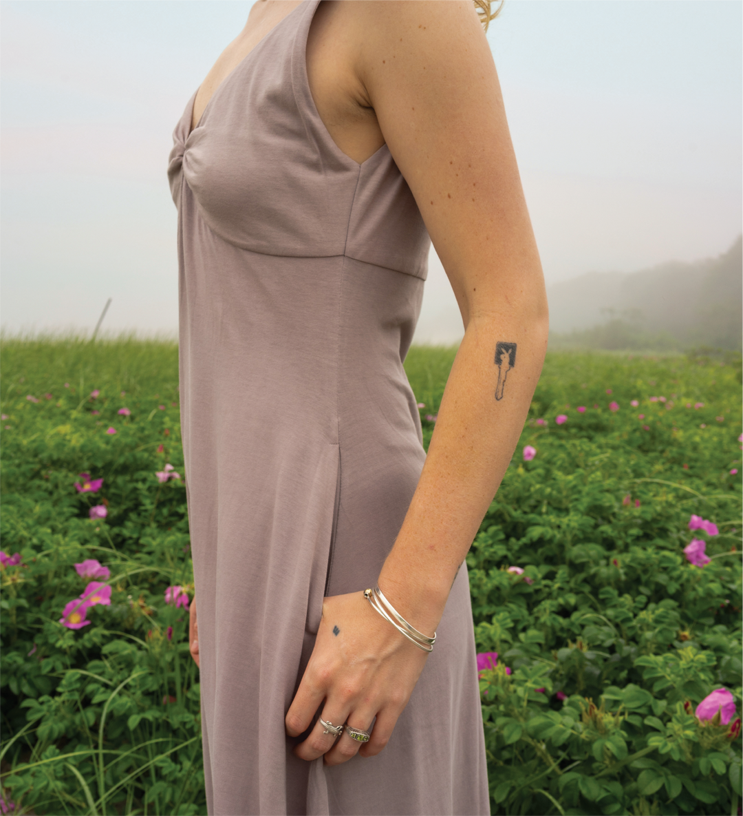 Dewdrop Dress mauve side view, sleeveless gathered bodice and flowy skirt