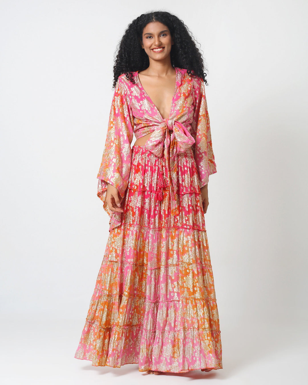 Bali skirt set: pink maxi skirt with ruffled tiers and matching V-neck top, knotted front