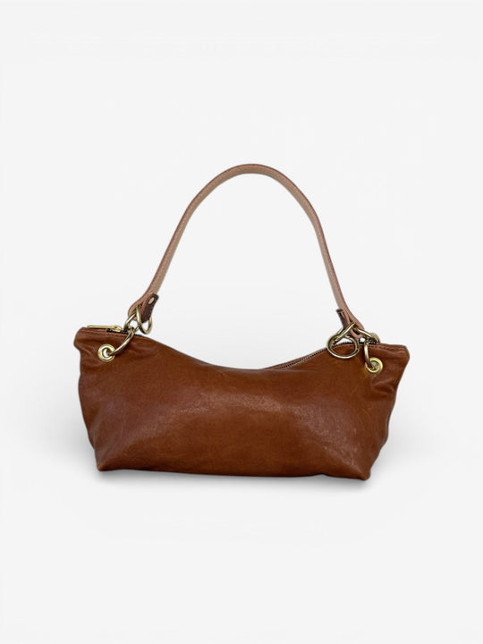 Brown leather hobo shoulder bag with curved handle and metal ring hardware