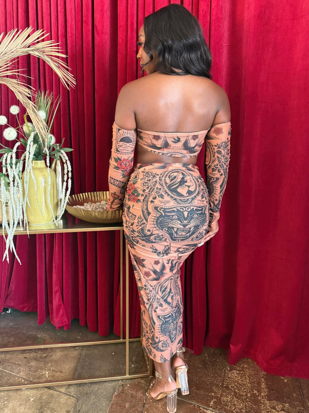 Boho ink print set, back view of off-shoulder bandeau crop top and fitted midi skirt