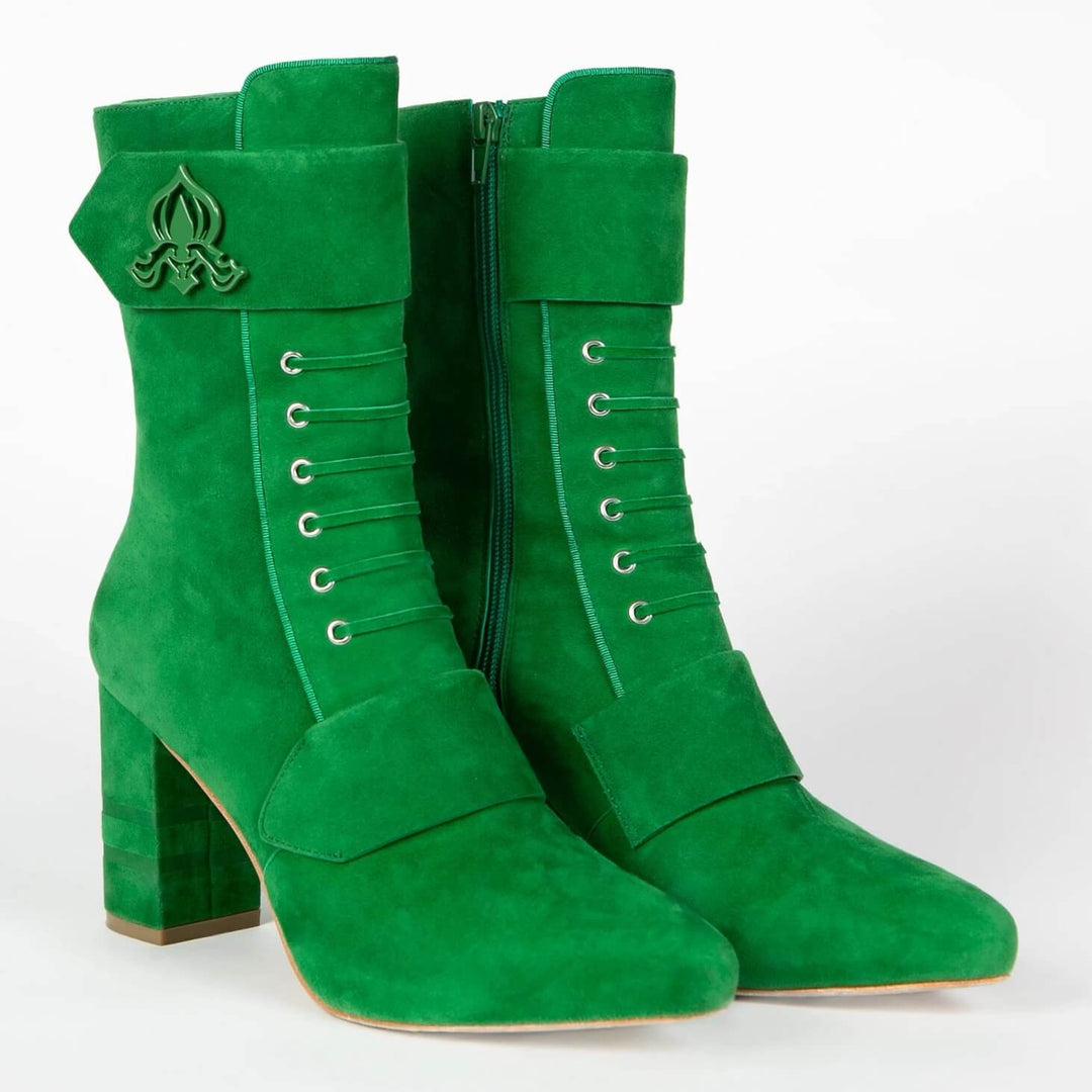 Green suede ankle boots with side zipper, lace-up eyelets, and block heel
