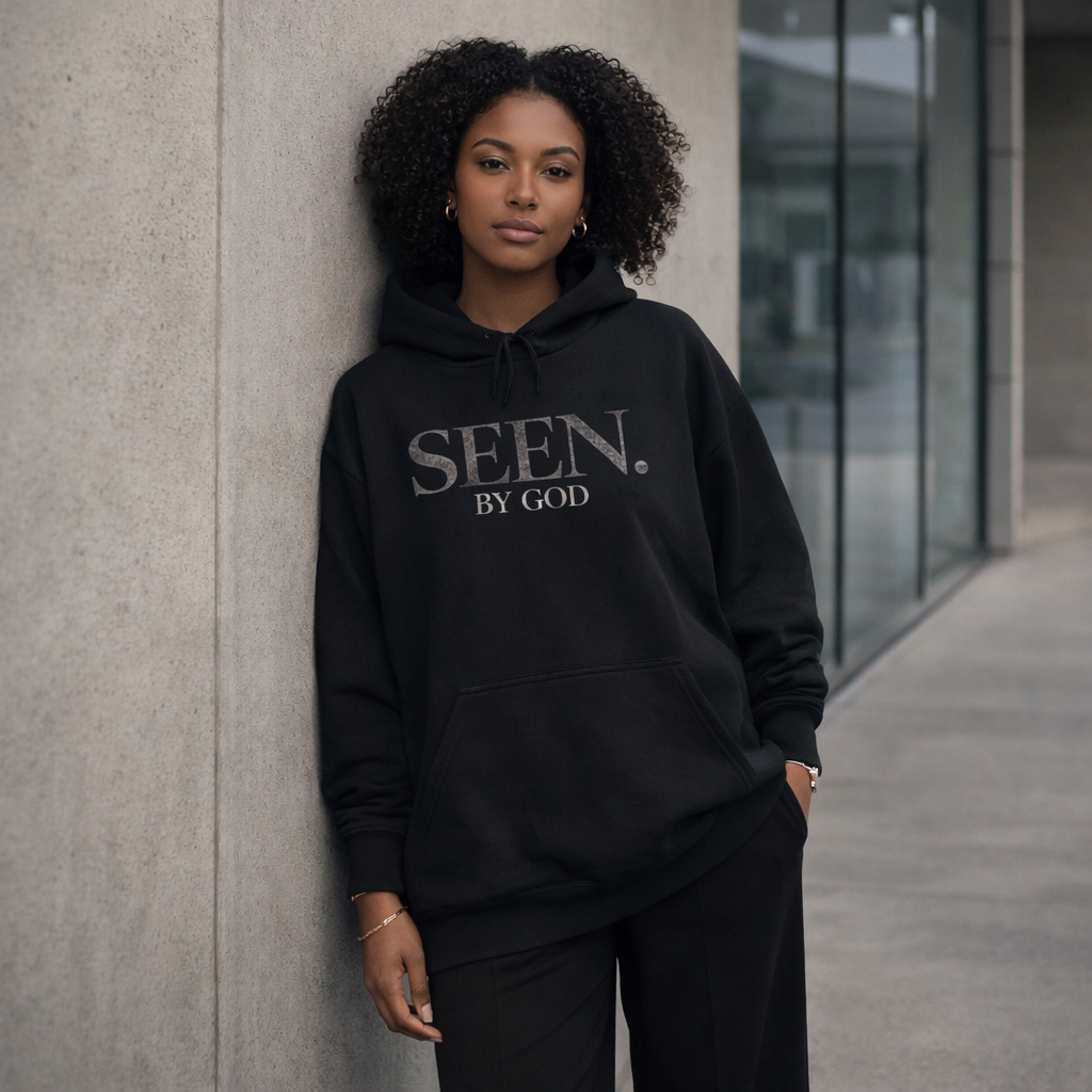 Black pullover hoodie with SEEN. by God logo, ribbed cuffs and kangaroo pocket