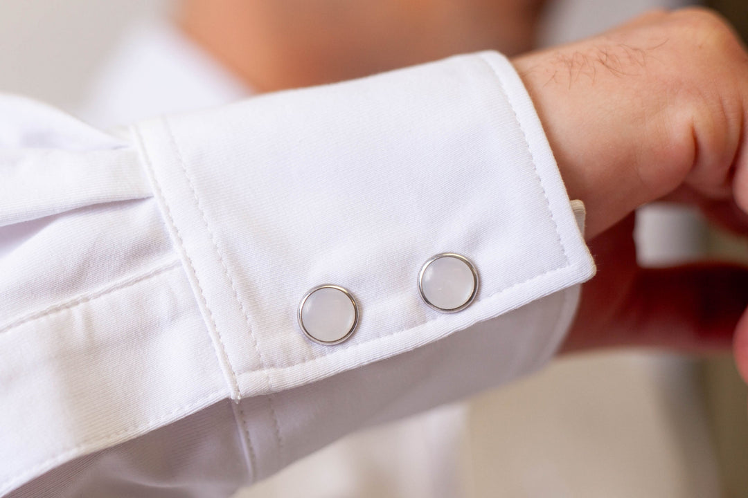 White Western tech shirt cuff with two snap-style buttons