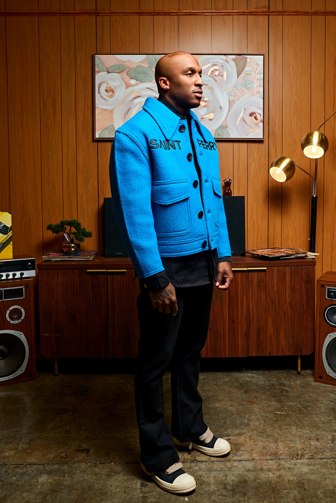 The Blue Love Boxy Jacket, profile view: chest pockets and dark button placket