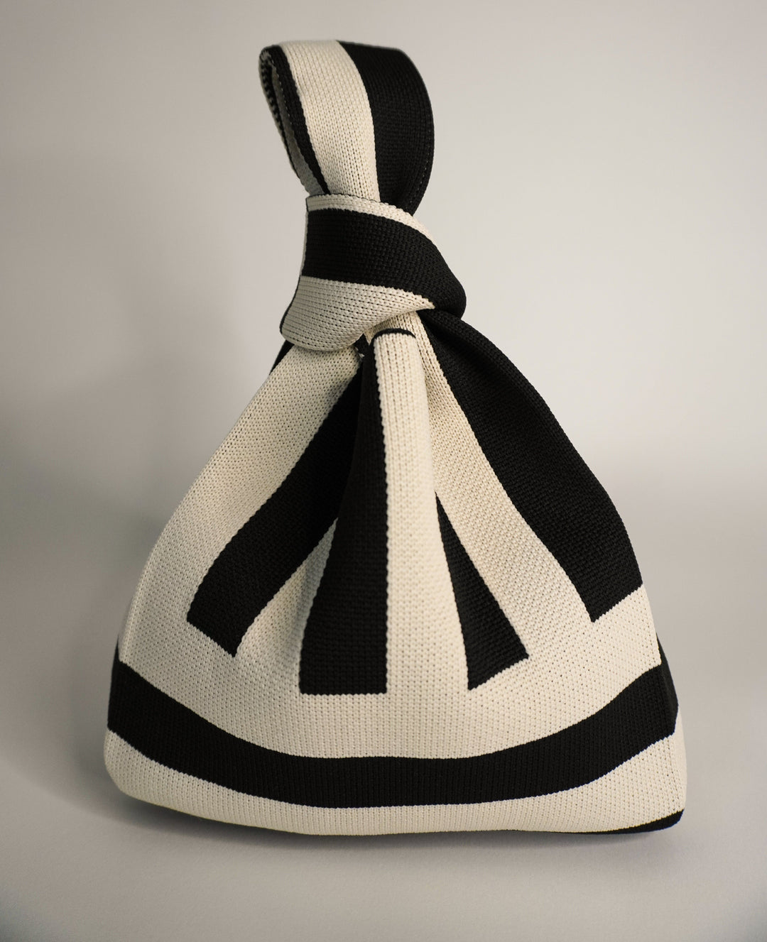 The Original² black and cream striped drawstring handbag with gathered top