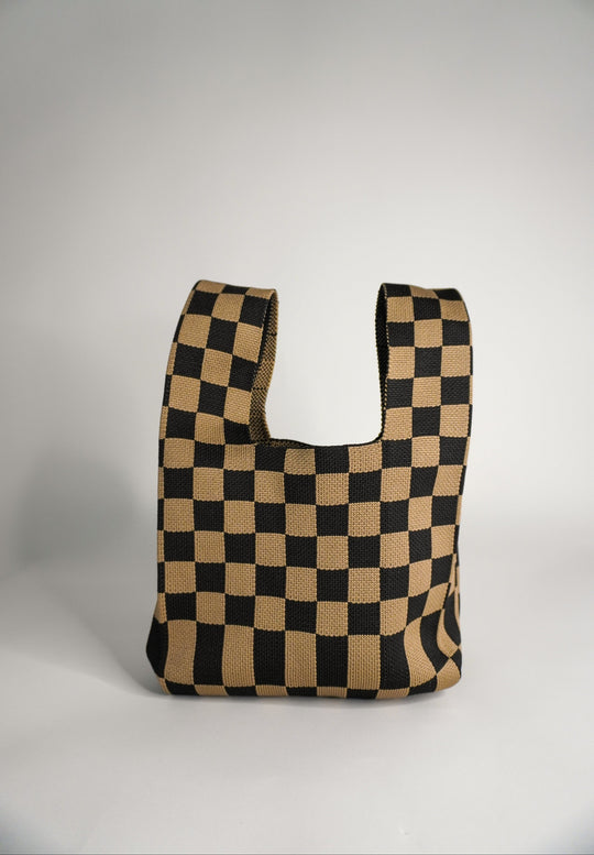 Checkered brown tote-style handbag with wide open front